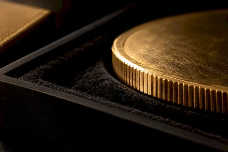 Close-up of anonymous gold coin edge